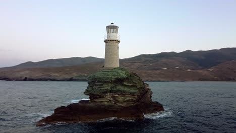 Orbit View of Chora of Andros Tourlitis Lighthouse at Twilight, Greece