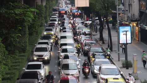 time-lapse of congested city traffic in the rain