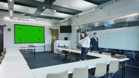 businesswoman is using tablet pc in conference room