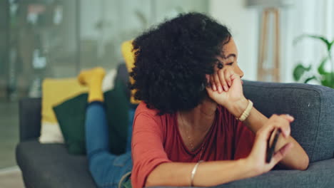 headphones, phone and black woman dance on sofa
