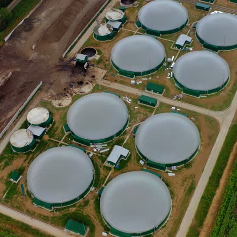 round roofs of bio gas station. view from above. video. factory out of town. modern plant. ecological production.