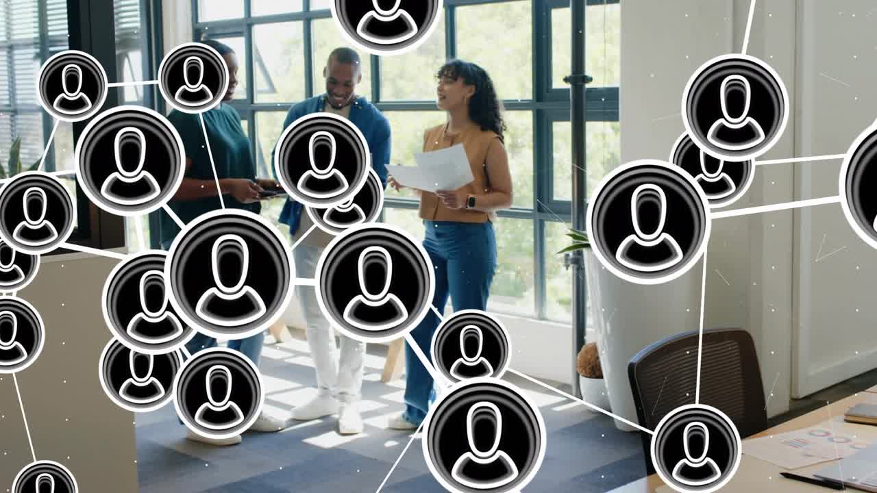 Team pointing at laptop and papers causing business network avatars emerging, shifting, revealing