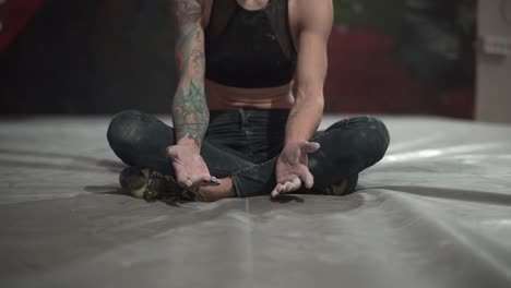 woman preparing for rock climbing session