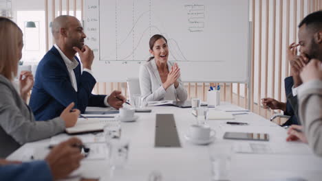 happy-business-woman-crying-tears-of-joy-laughing-in-boardroom-meeting-enjoying-funny-joke-having-fun-with-colleagues-in-office