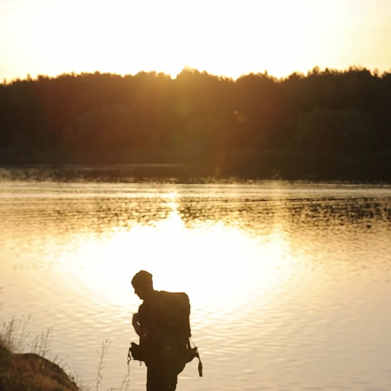Hiker Descending On A Hill