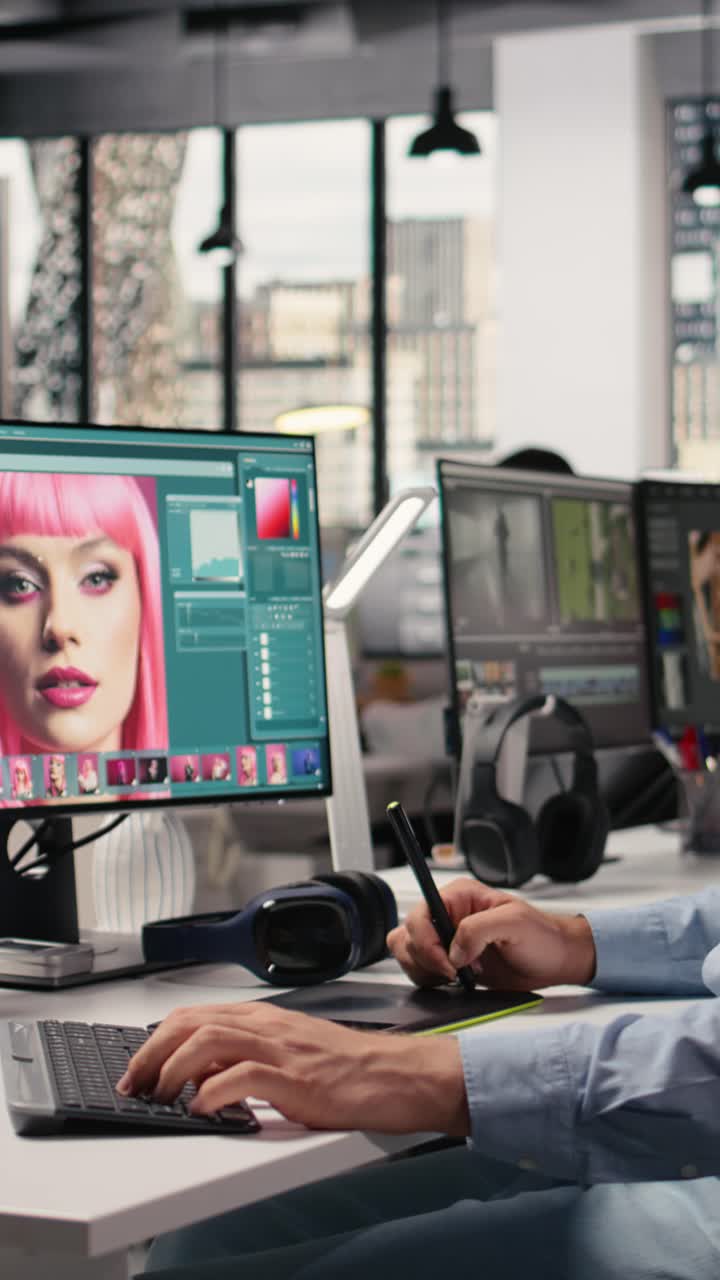 Vertical Video Photographer Working On Image Selection And Editing In Creative Agency Office
