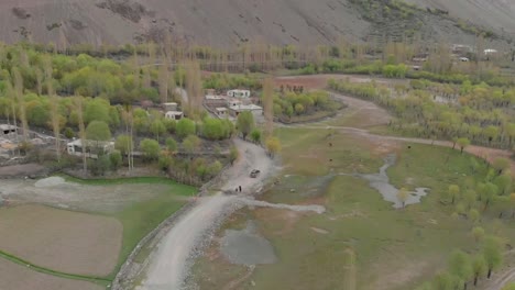 aerial over local ghizer valley village in pakistan