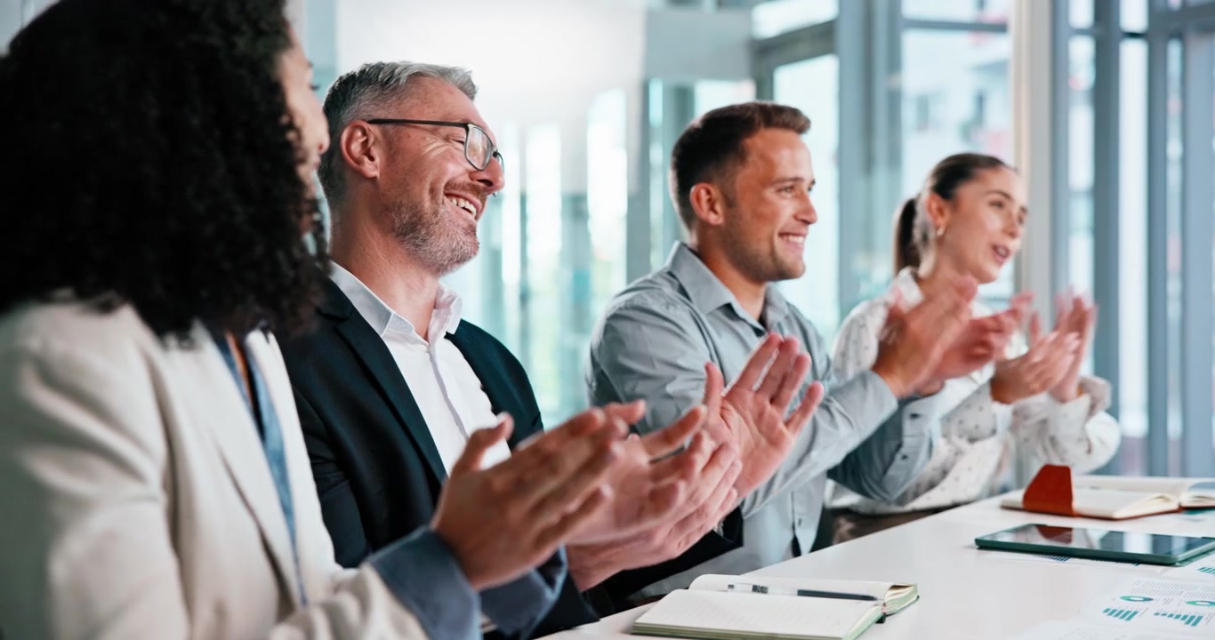 Diverse Business Team Applauding During a Professional Meeting