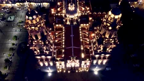 drone flight at night, taking the main facade of the cathedral of morelia, michoacan, mexico