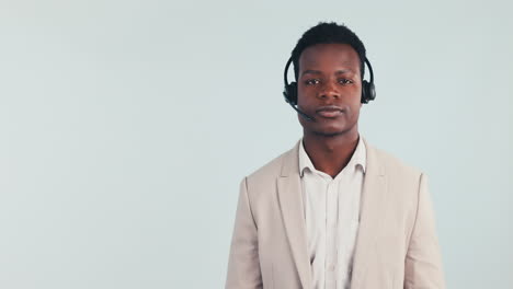 Call-center,-pointing-and-black-man-in-studio