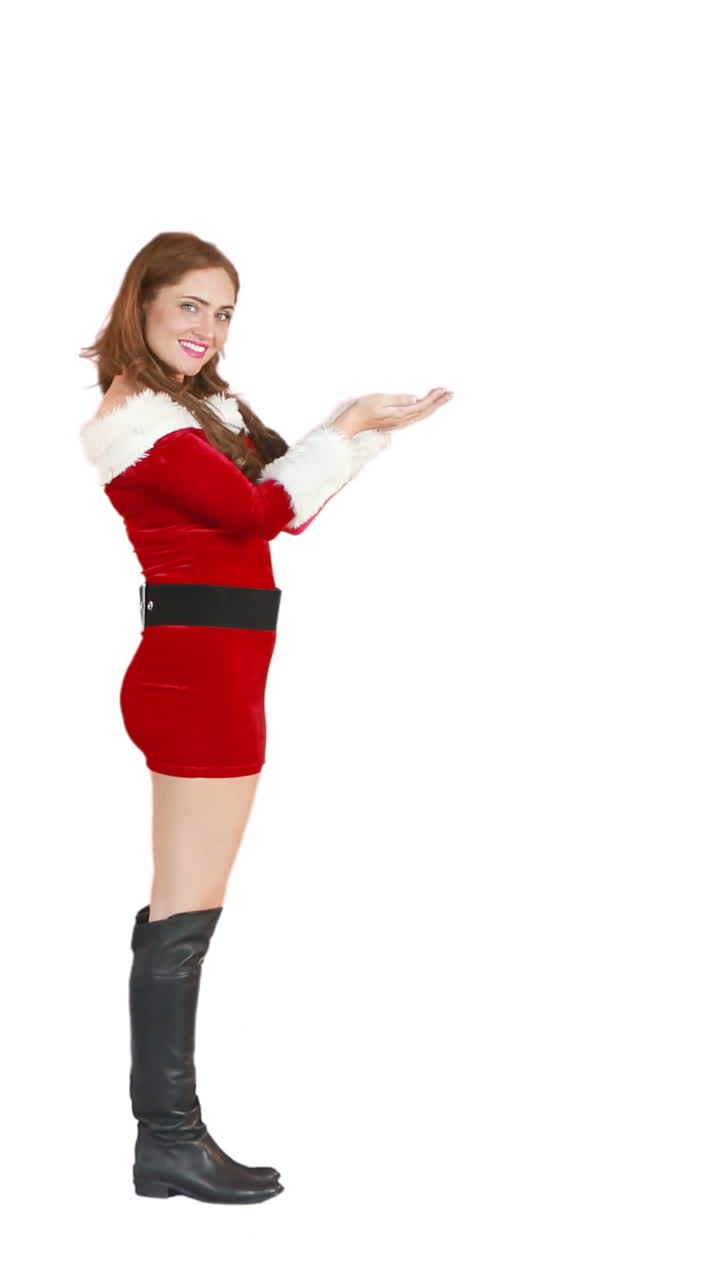 크리스마스 소녀가 고 키스를 불어넣습니다.