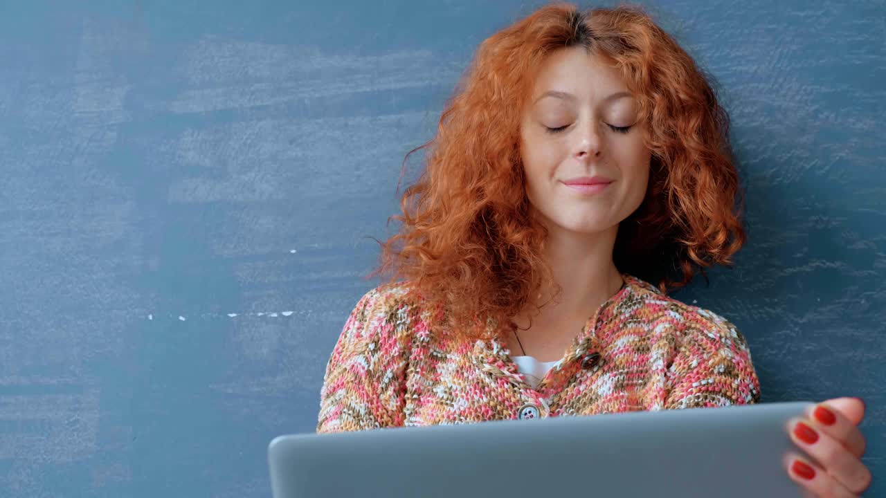 Woman Working on Laptop
