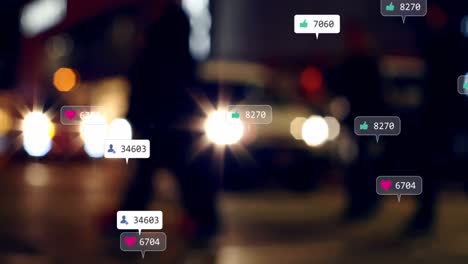 Animation-of-social-media-icons-and-numbers-over-out-of-focus-city-and-traffic-lights