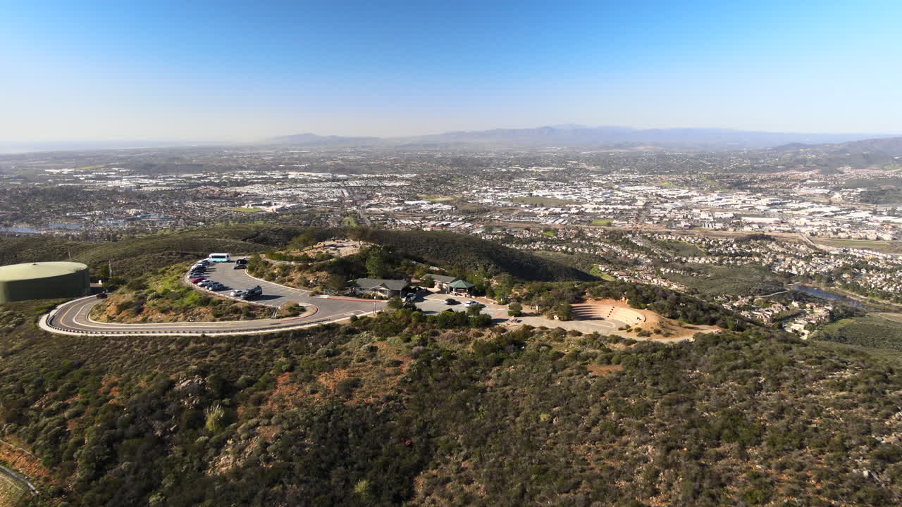Breathtaking View Of Double Peak Park At The Hilltop With A Panoramic View Of The City During Daytime In San Marcos, California, United States. aerial pull back, wide