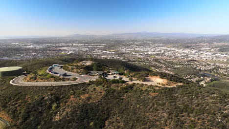 Breathtaking View Of Double Peak Park At The Hilltop With A Panoramic View Of The City During Daytime In San Marcos, California, United States. aerial pull back, wide