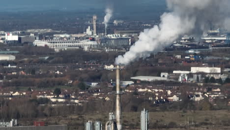 Wilton-site,-ex-ICI-sembcorp,-chemical,-works,-teesside---clip-2-static-clip-with-smoke-from-chimney---drone-uav-aerial-prores-footage