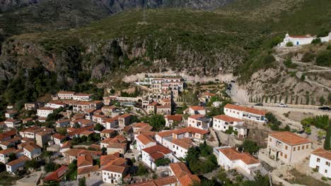 scenic mediterranean village of dhermi: red roofs, stone walls, and charming narrow alleys on the mountain slope, a tourism gem in albania