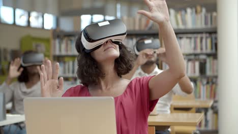 smiling caucasian woman experiencing vr headset