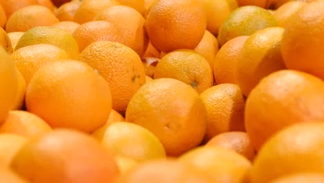 harvest of yellow oranges on the stall of the vegetable market harvest of yellow oranges on the stall of the vegetable market slow motion 240 fps