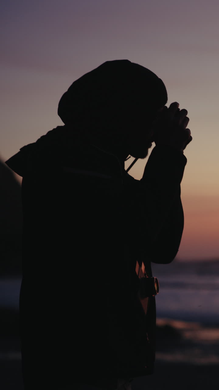 Silhouette of Photographer at Sunset on the Beach