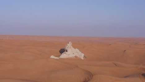 4k drone footage, aerial view of fossil rocks plateau in mleiha desert with sand ripples, geological landscape of the sphinx in sand dunes desert in the united arab emirates, drone videos