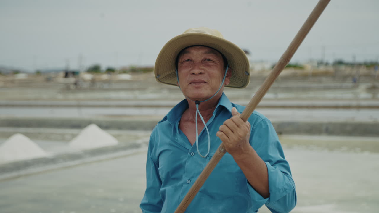 Portrait of a Salt Worker in a Salt Field