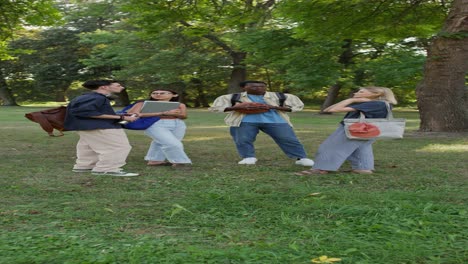 students discussing in a park