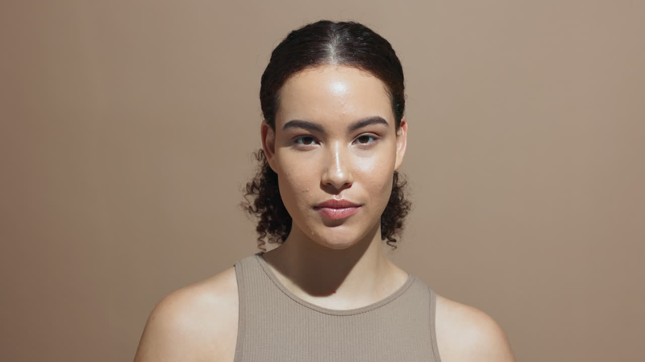 A beautiful woman poses for a portrait