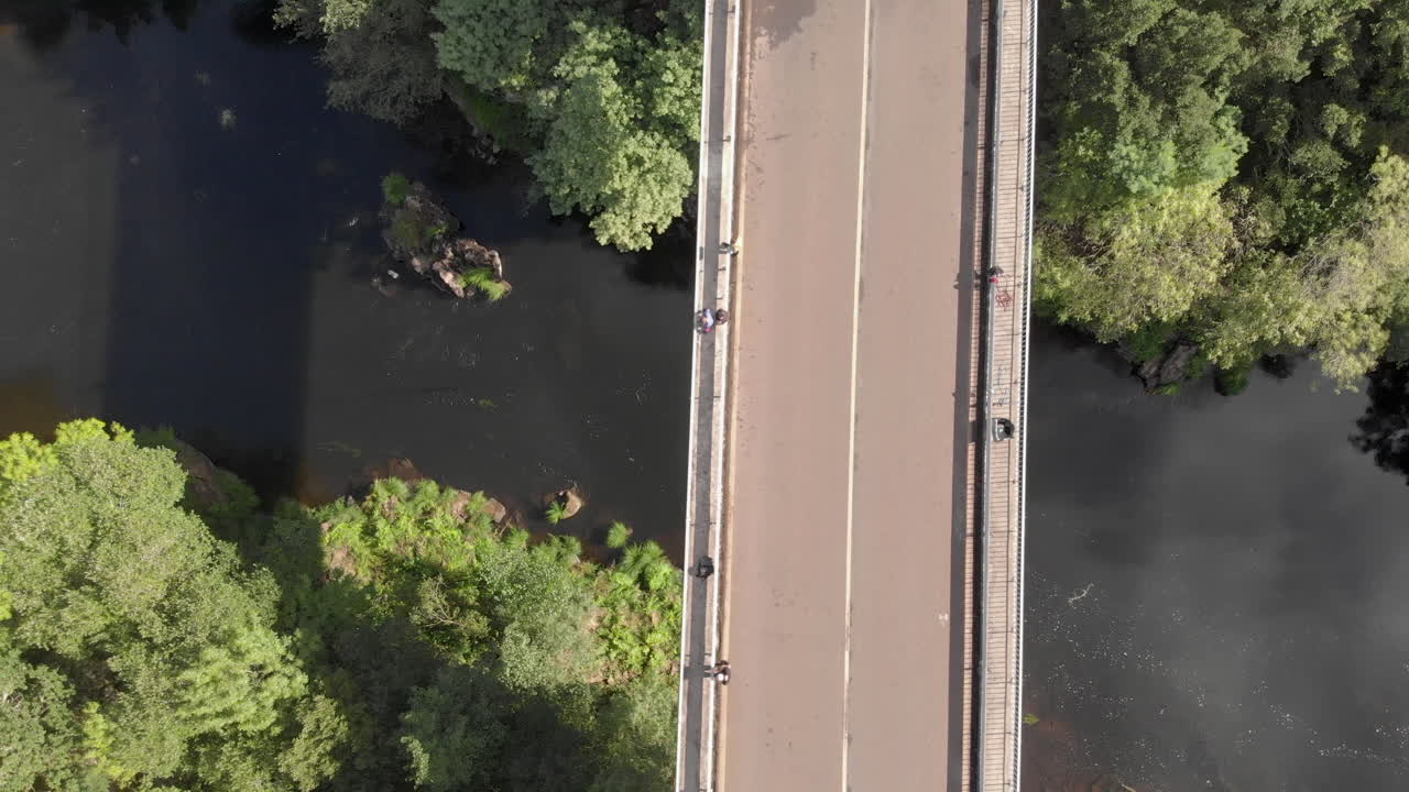Blue Car Passes By In Pontevea Bridge Over The Ulla River In Galicia, Spain - aerial drone, top-down shot