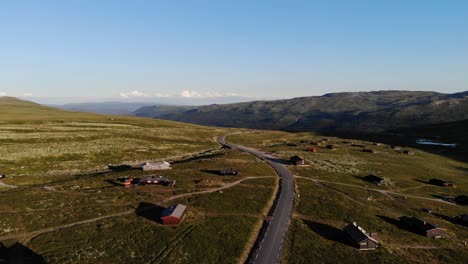 Mountain-road-and-mountain-cabins-along-it