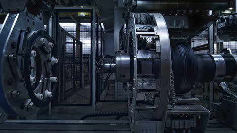Modern robotic automobile tire production machine working automatically in plant