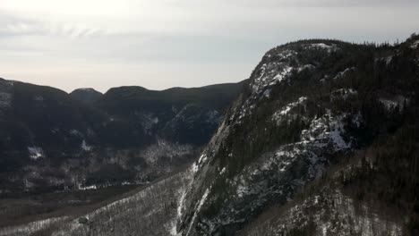 mountain ridges with dense alpine woodland during winter at mont du dome in quebec, canada