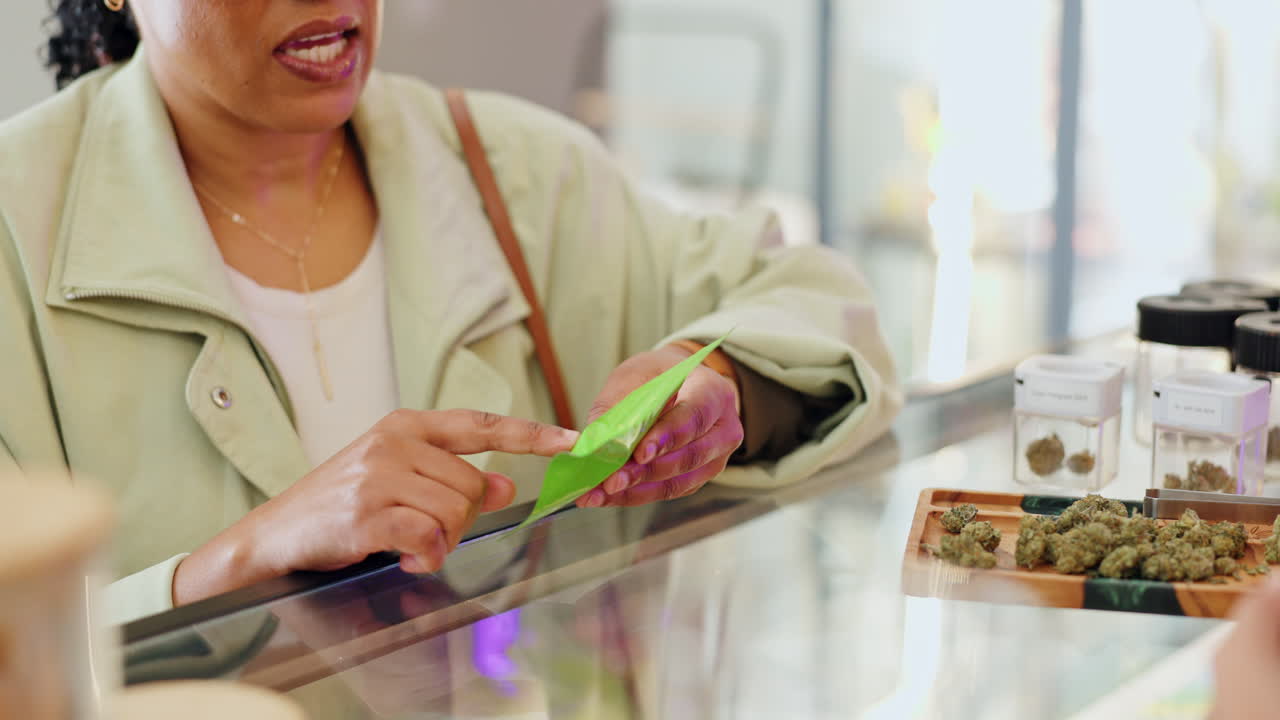Woman Buying Cannabis at Dispensary