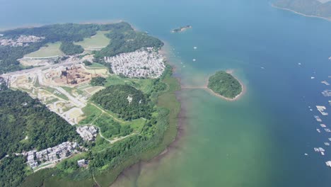 Hong-Kong-Tseng-Tau-Tsuen-waterfront-houses,-Aerial-view