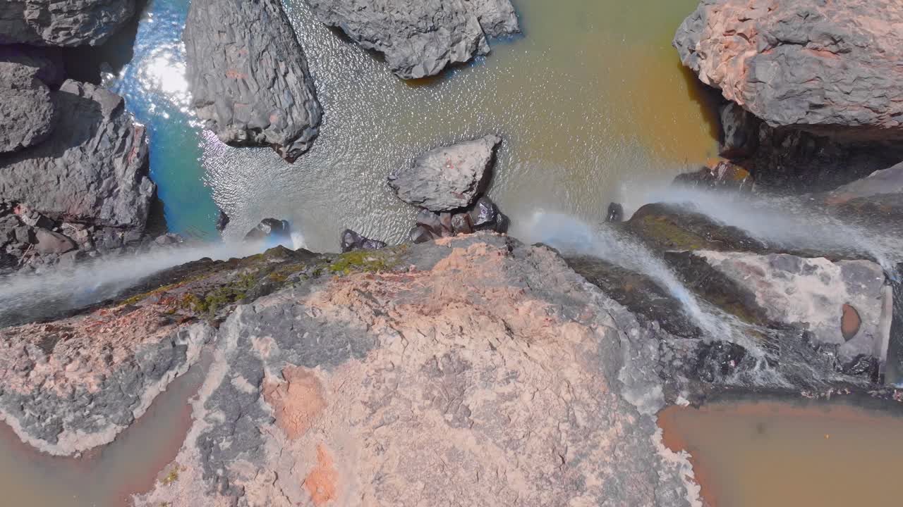 Aerial View of Stunning Waterfall cascading over Rocks