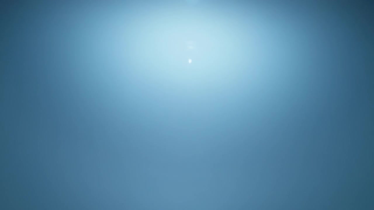 Overlay of blue lens flares in slow motion