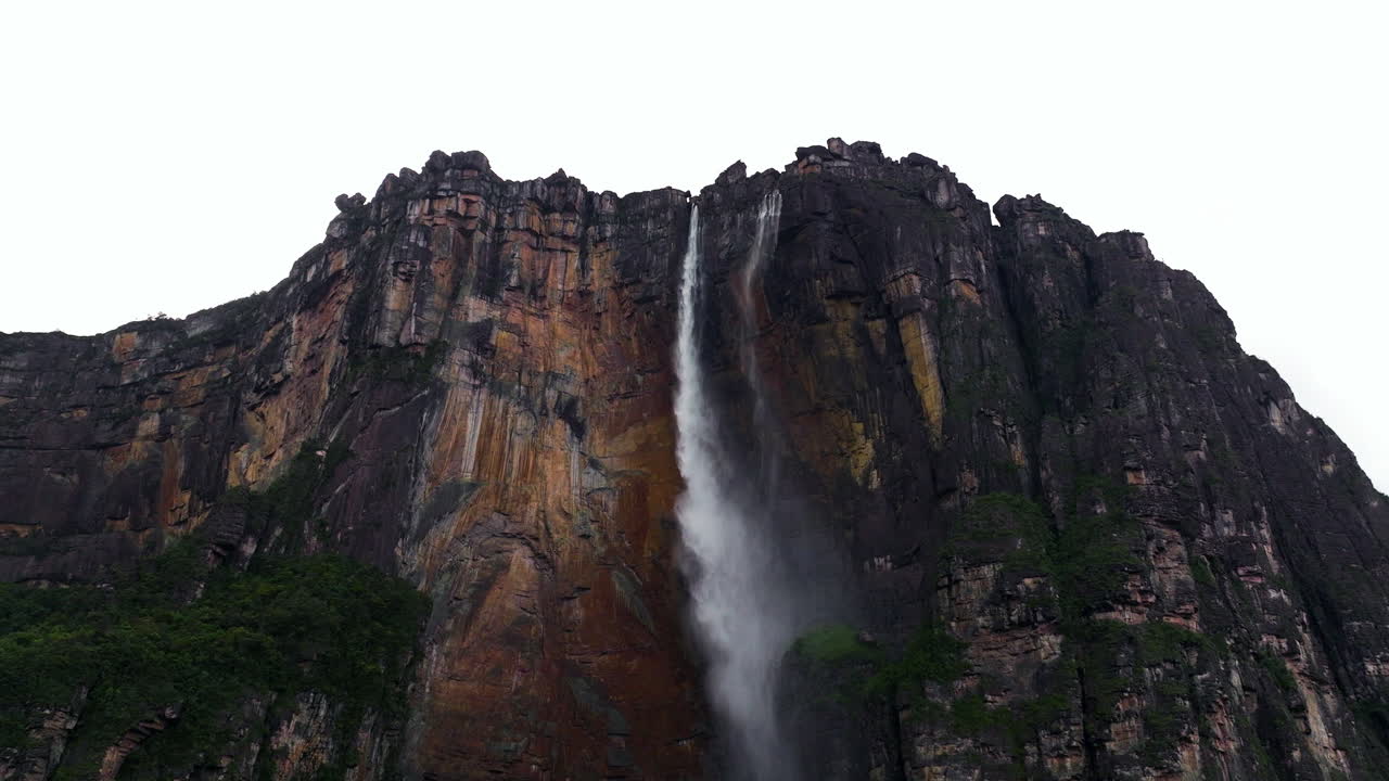 Majestic Waterfall Cascading Down Rocky Cliff