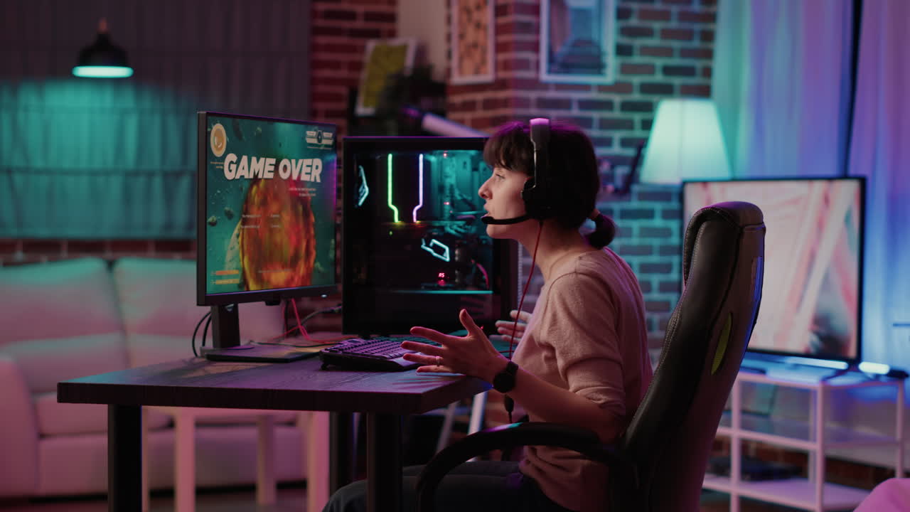 Gamer girl feeling disappointed after losing difficult level in online space shooter on gaming pc