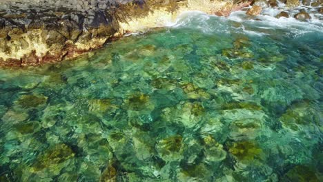 Crystal-clear-Atlantic-ocean-water-and-rocky-coast-of-Tenerife