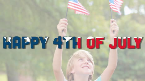 independence day text against boy holding two u.s. flags