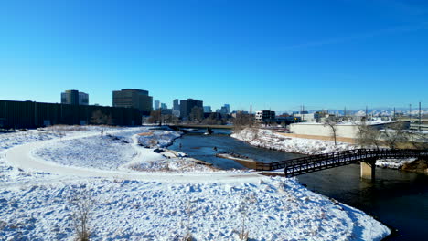 Drone-footage-of-snow-covered-Denver-city-park-and-the-South-Platte-River