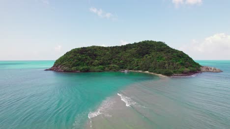 4k-Aerial-Drone-Footage-of-Mae-Haad-and-Koh-Ma-on-Koh-Phangan-Island-Thailand,-Pull-Back-to-Reveal-Tourists-Walking-on-Sandbar