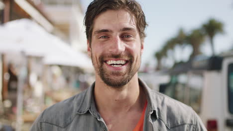 portrait of laughing man travel in city street