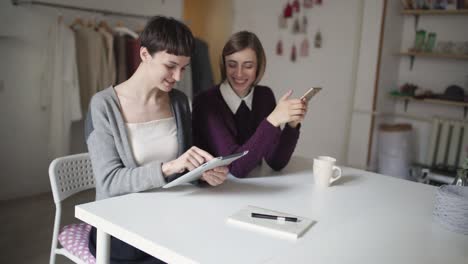 two young woman have fun leisure and using electronic devices for communication