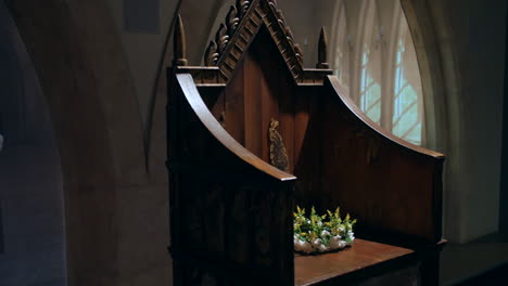 a historic wooden throne with detailed carvings