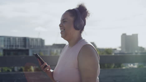 Cheerful-plus-size-woman-exercising