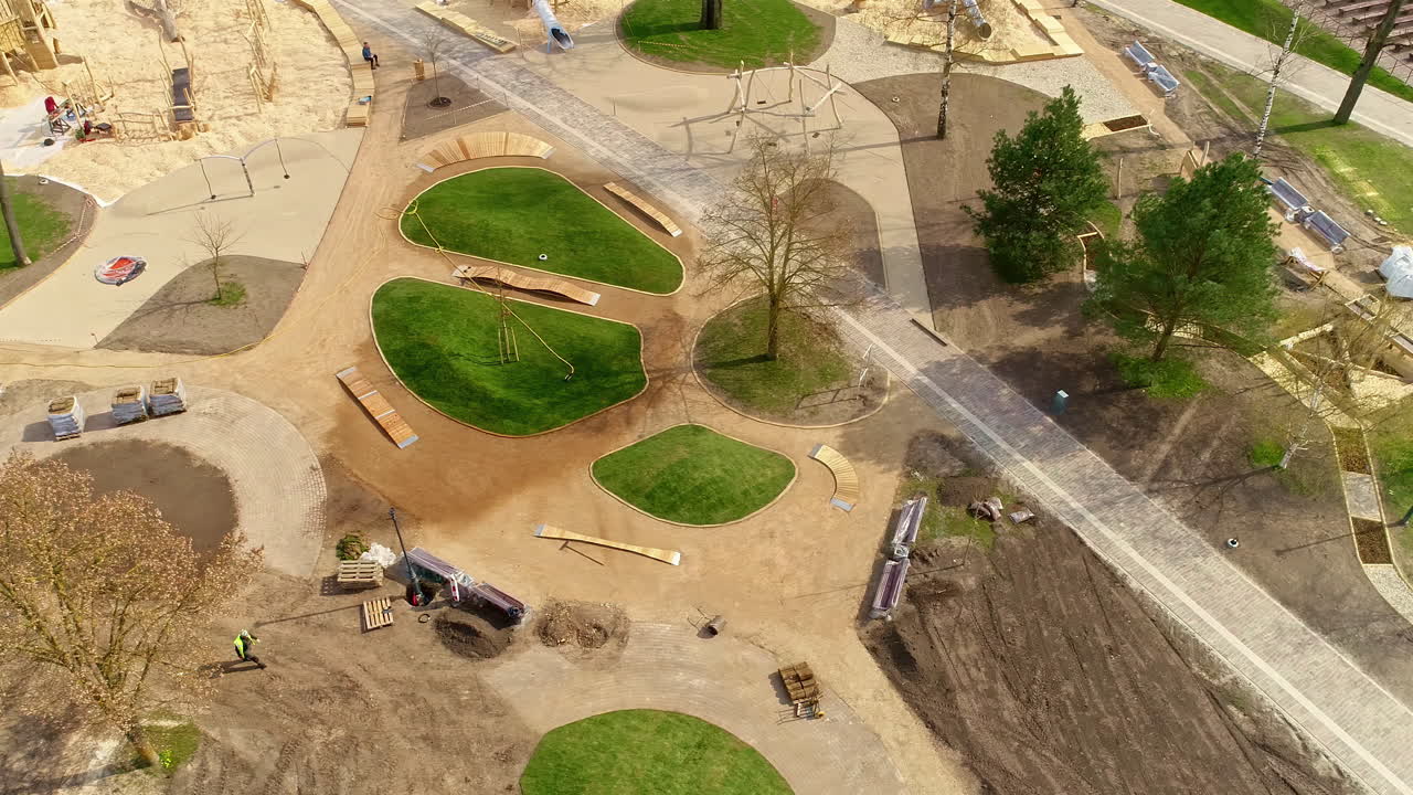 Landscaping a public city park and green space - aerial parallax