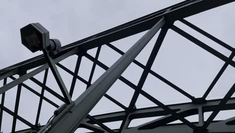 steel supports and struts of a metal device with an old lantern of the hohenzollern bridge in cologne