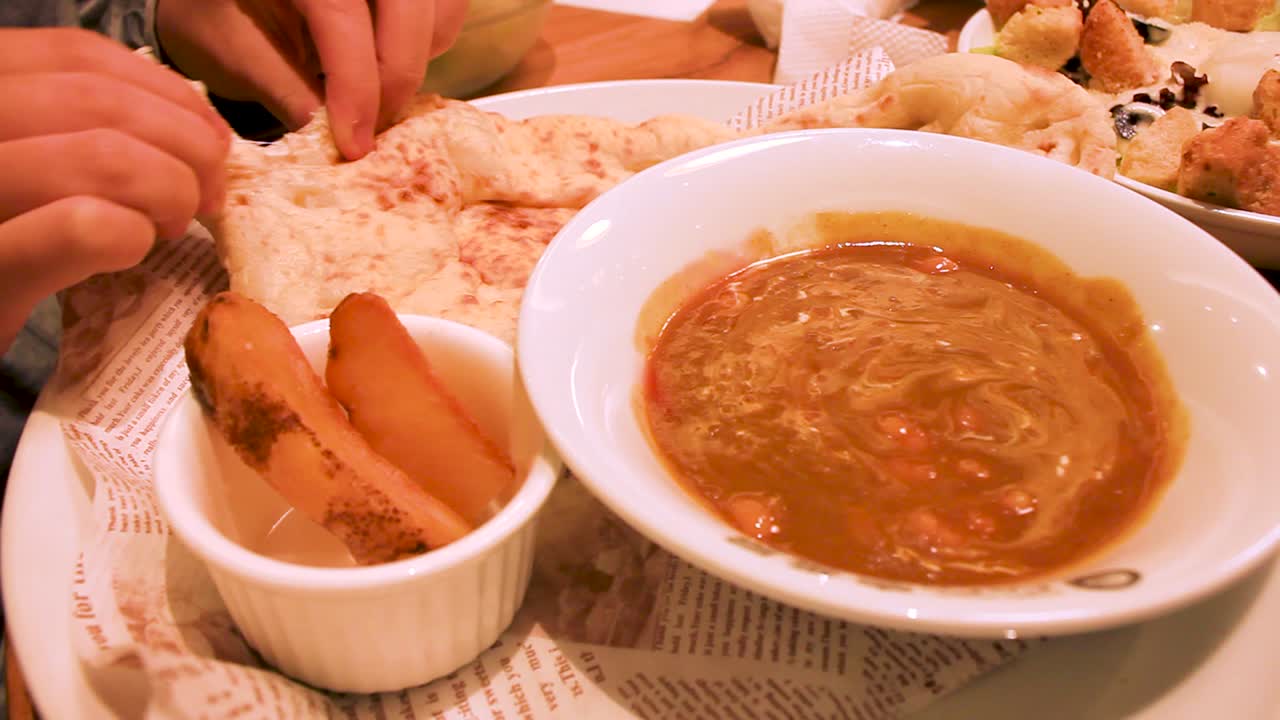Indian style pancakes with curry sauce, gourmet lunch set in Japanese restaurant