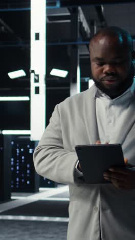 vertical video admin in data center using tablet to develop disaster recovery plans